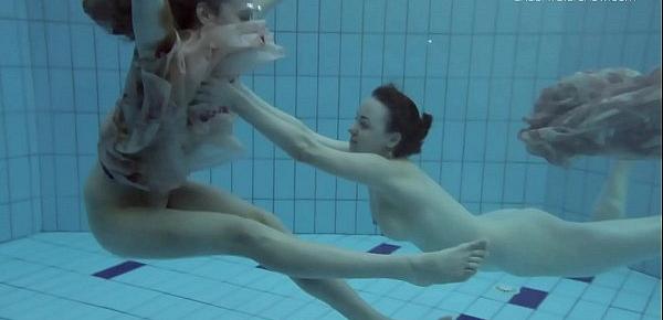  Two hot hairy beauties underwater